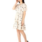 Trendy polka dots midi dress in cream with black dots and puff sleeves for stylish occasions