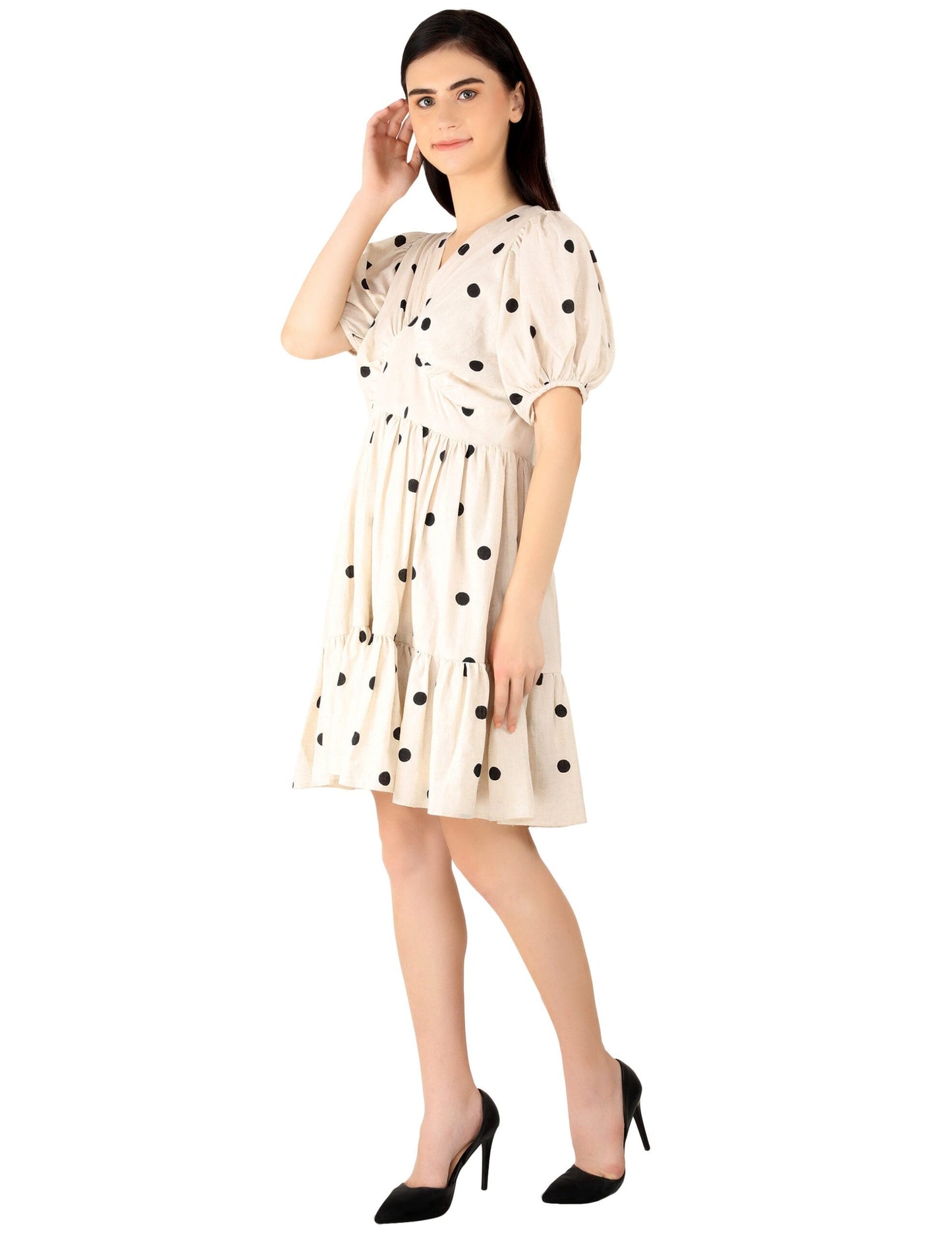 Trendy polka dots midi dress in cream with black dots and puff sleeves for stylish occasions