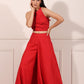 Trendy red festival wear set featuring a stylish crop top and wide-legged pants for festive celebrations