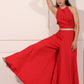 Trendy red festival wear set featuring a stylish crop top and wide-leg pants for festive occasions