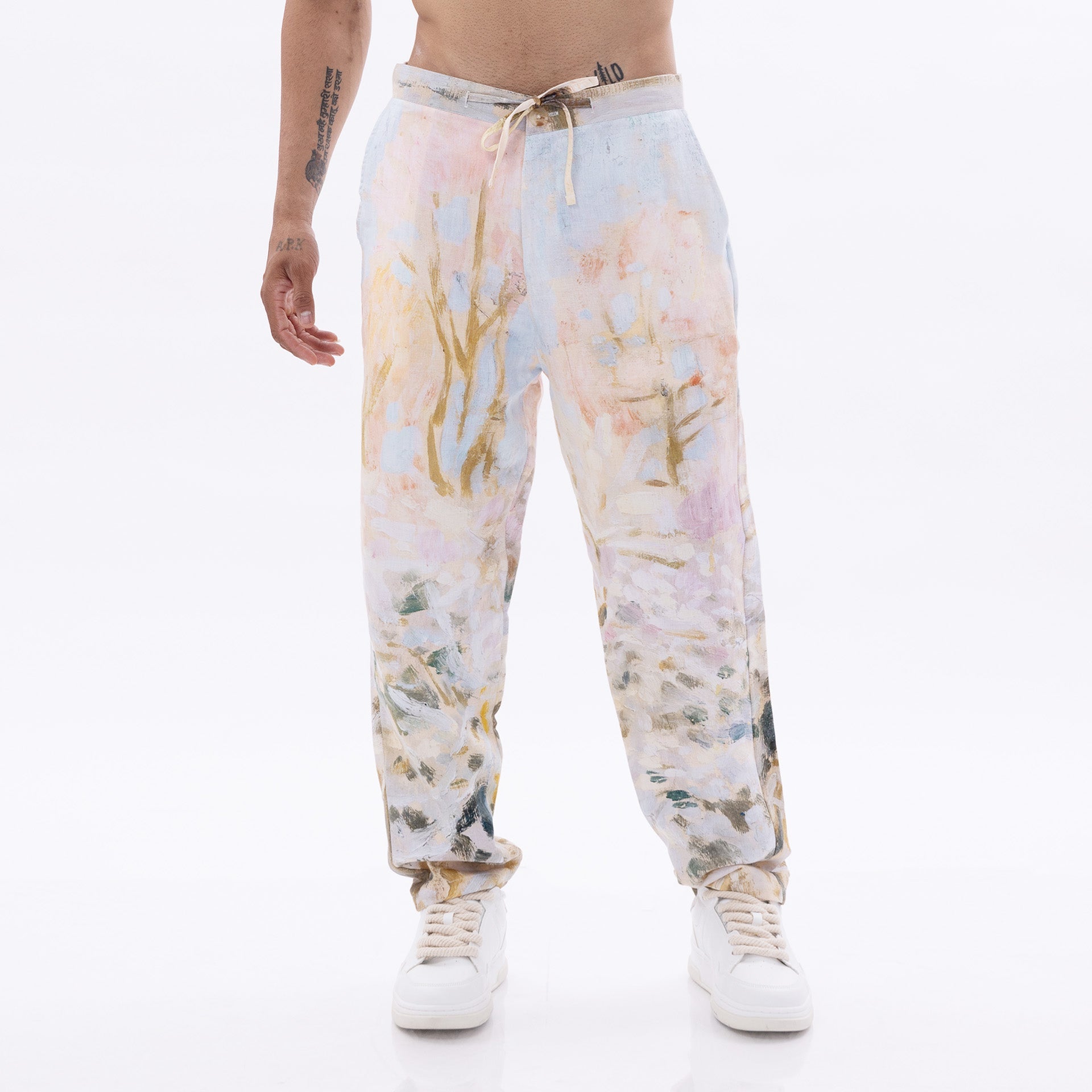 Stylera trendy relaxed fit pants in a pastel watercolor design with a drawstring waist