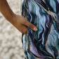 Trendy satin pajamas set with a beautiful abstract pattern featuring a stylish pocket detail