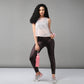 Trendy sheer crop tops for women styled with high-waisted leggings and a water bottle