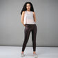 Trendy sheer crop tops for women styled with sleek black leggings and sneakers for a chic workout look