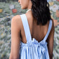 Stylera light blue dress back view with bow tie and pearl necklace trendy sleeveless maxi dresses