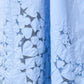 Stylera light blue dress closeup with heart and clover cutouts and sheer panels trendy sleeveless maxi dresses