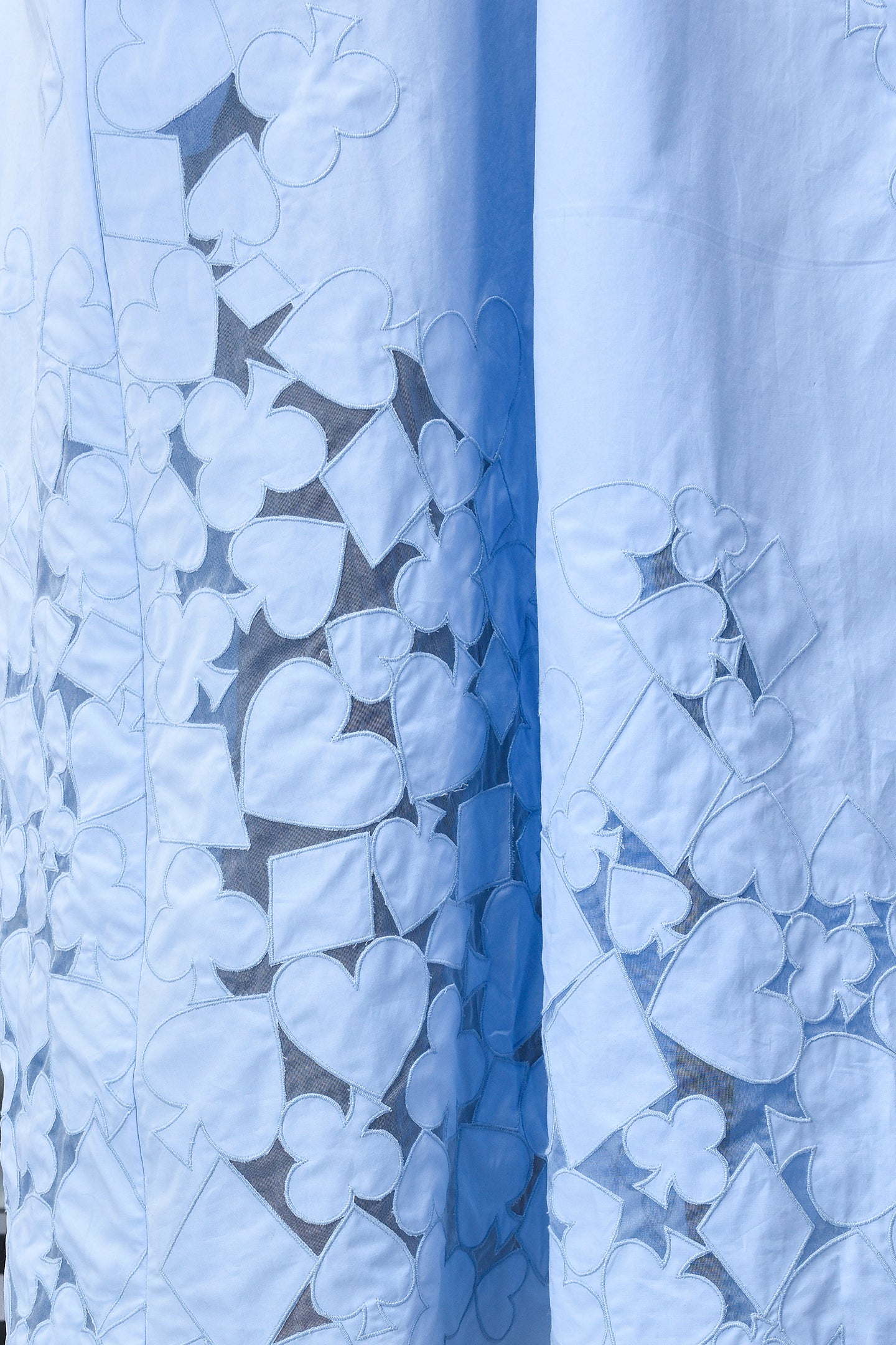 Stylera light blue dress closeup with heart and clover cutouts and sheer panels trendy sleeveless maxi dresses