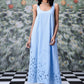 Stylera light blue scoop neck dress with floral cutout hem on model trendy sleeveless maxi dresses