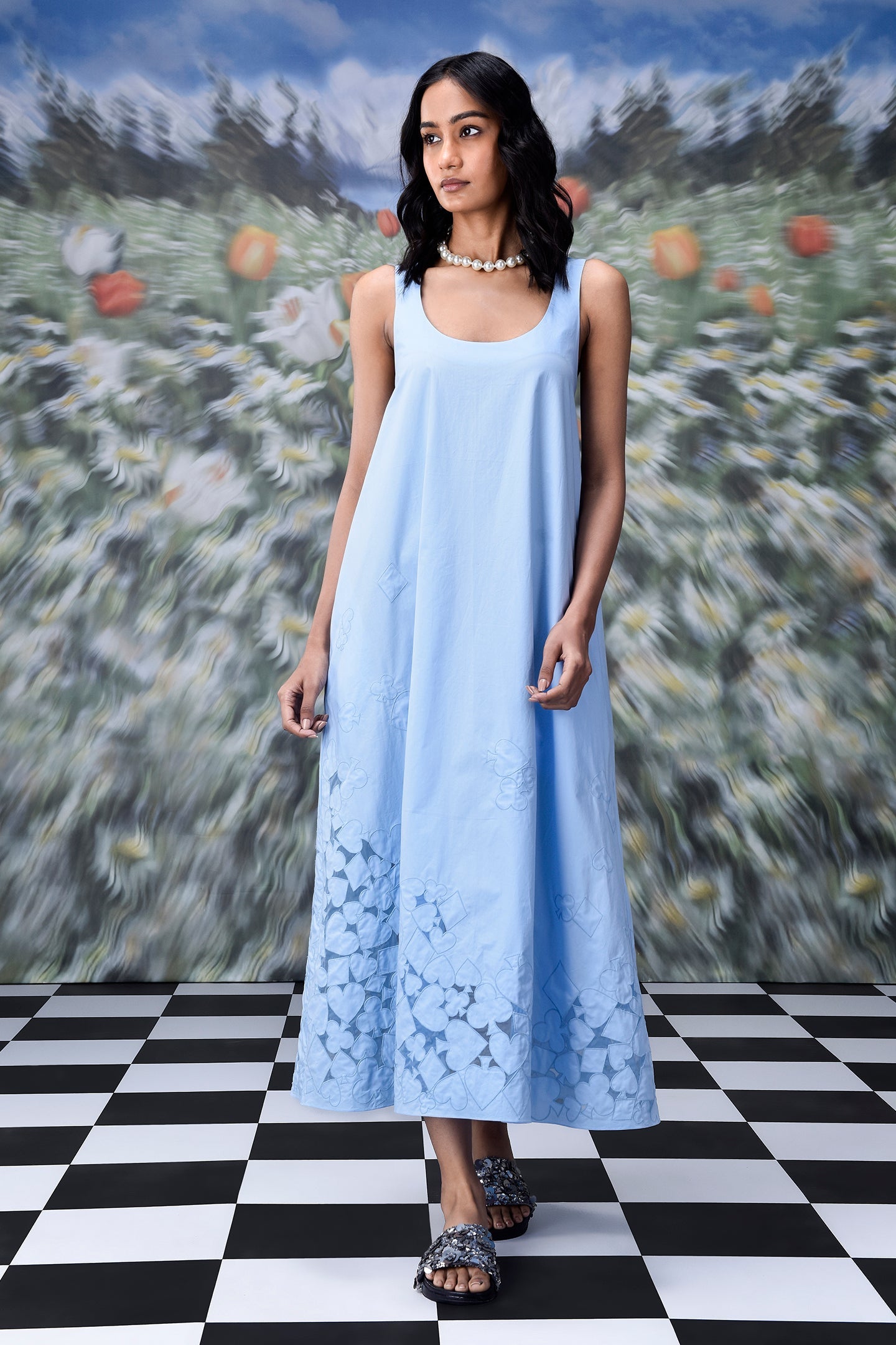 Stylera light blue scoop neck dress with floral cutout hem on model trendy sleeveless maxi dresses