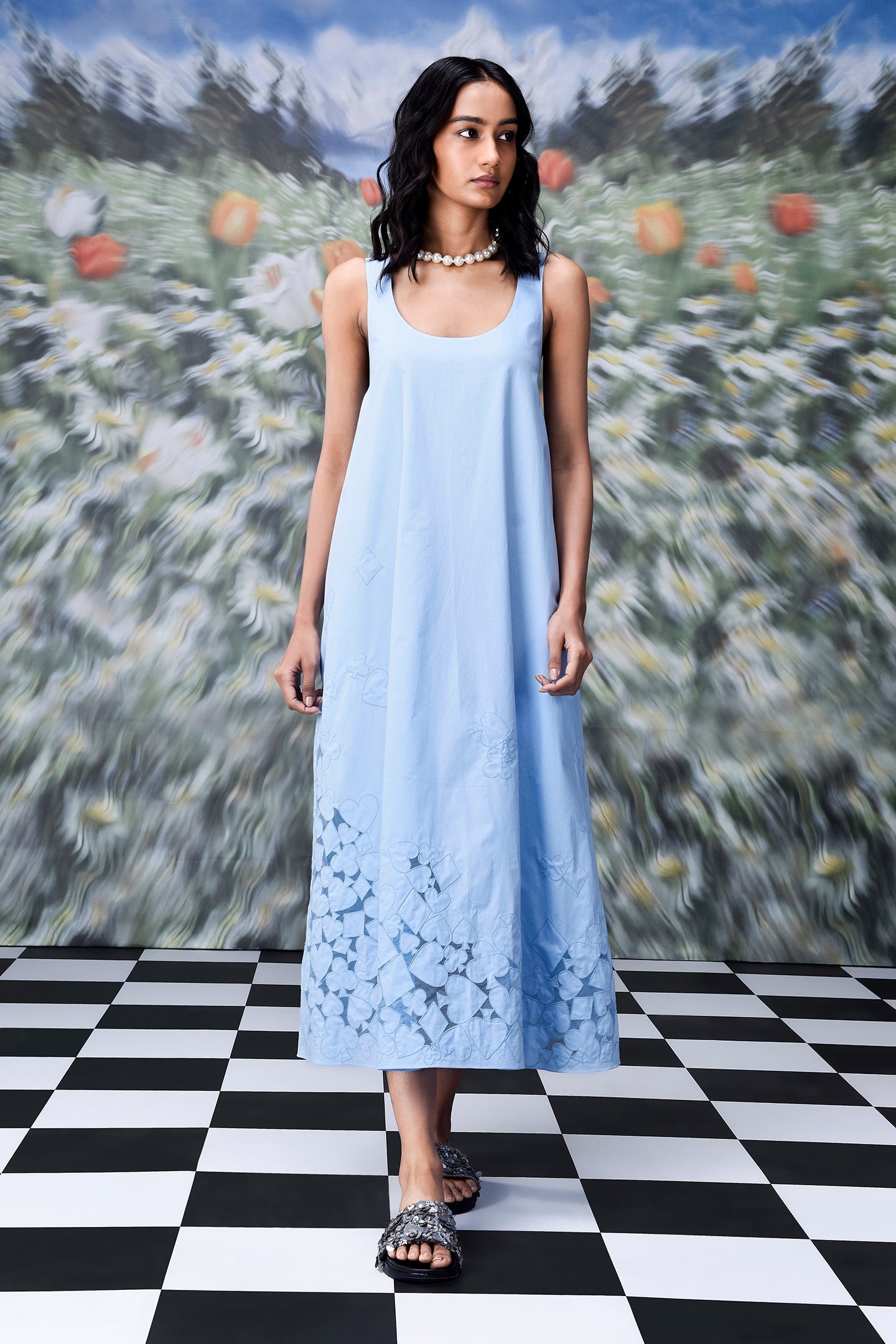 Stylera light blue sleeveless maxi dress with floral cutout hem and pearl necklace trendy sleeveless maxi dresses