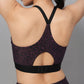 Trendy sports bras with back design featuring a stylish cutout and adjustable straps in a purple leopard print