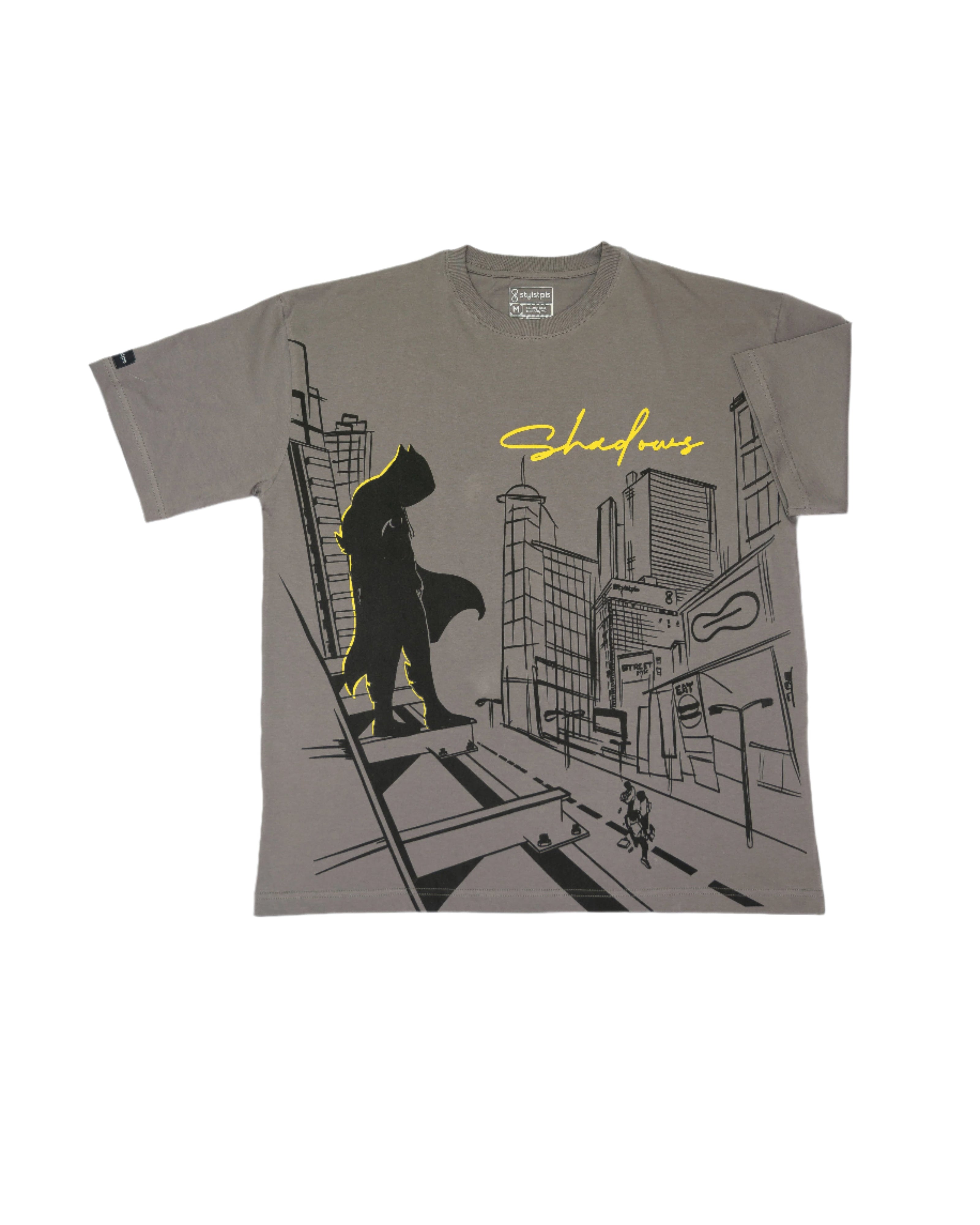 Stylstpls trendy statement oversized t-shirt featuring a cityscape graphic with a silhouette design