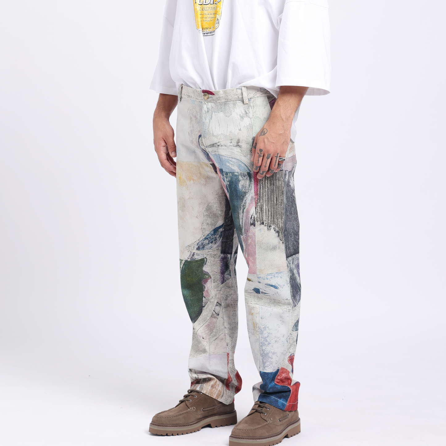 Stylera trendy statement pants for men featuring a unique artistic design and a relaxed fit