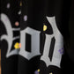 Stylstpls trendy streetwear black t-shirt featuring colorful floral designs and a bold graphic print