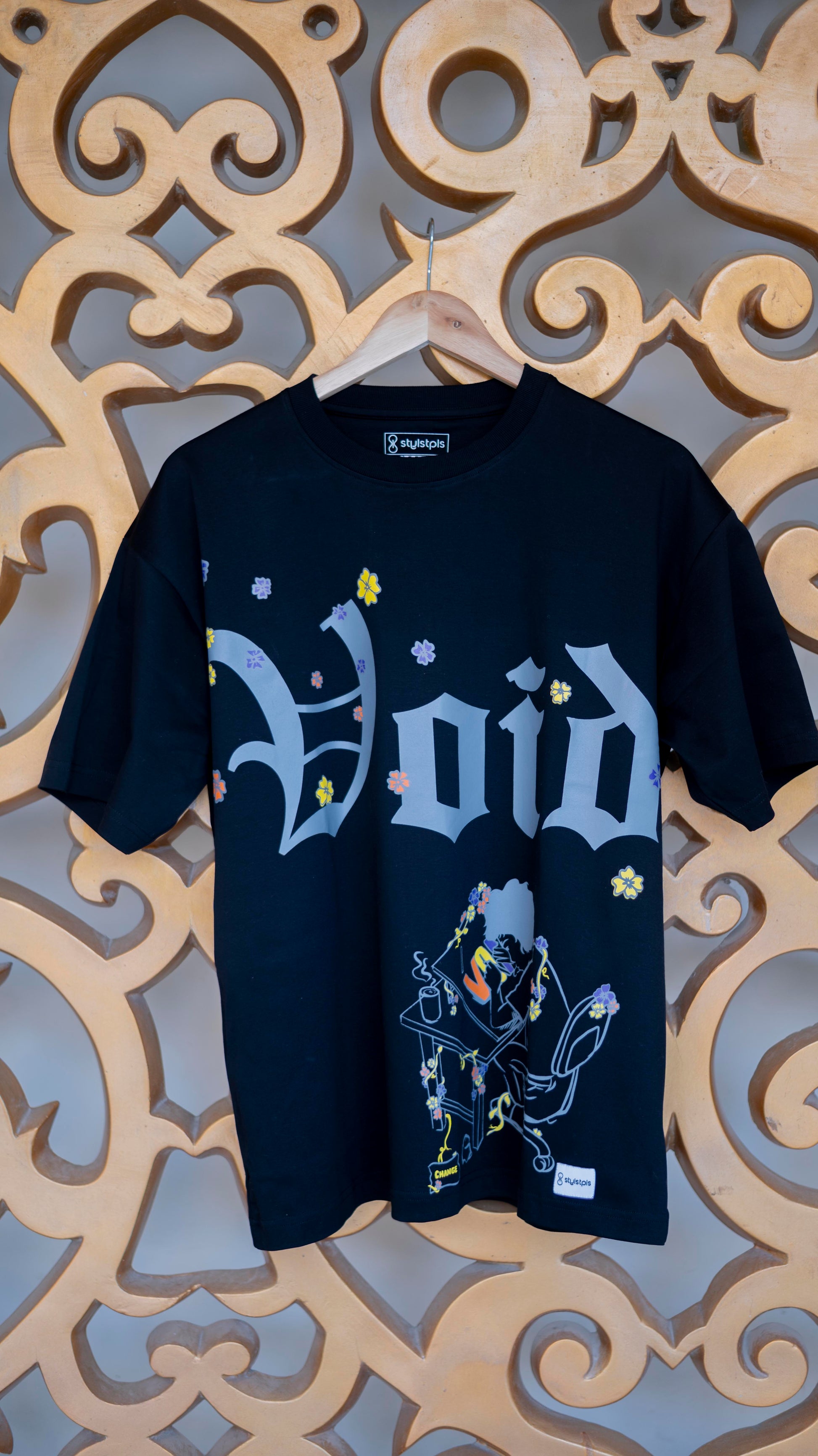 Stylstpls trendy streetwear black t-shirt featuring 'Void' graphic with floral designs