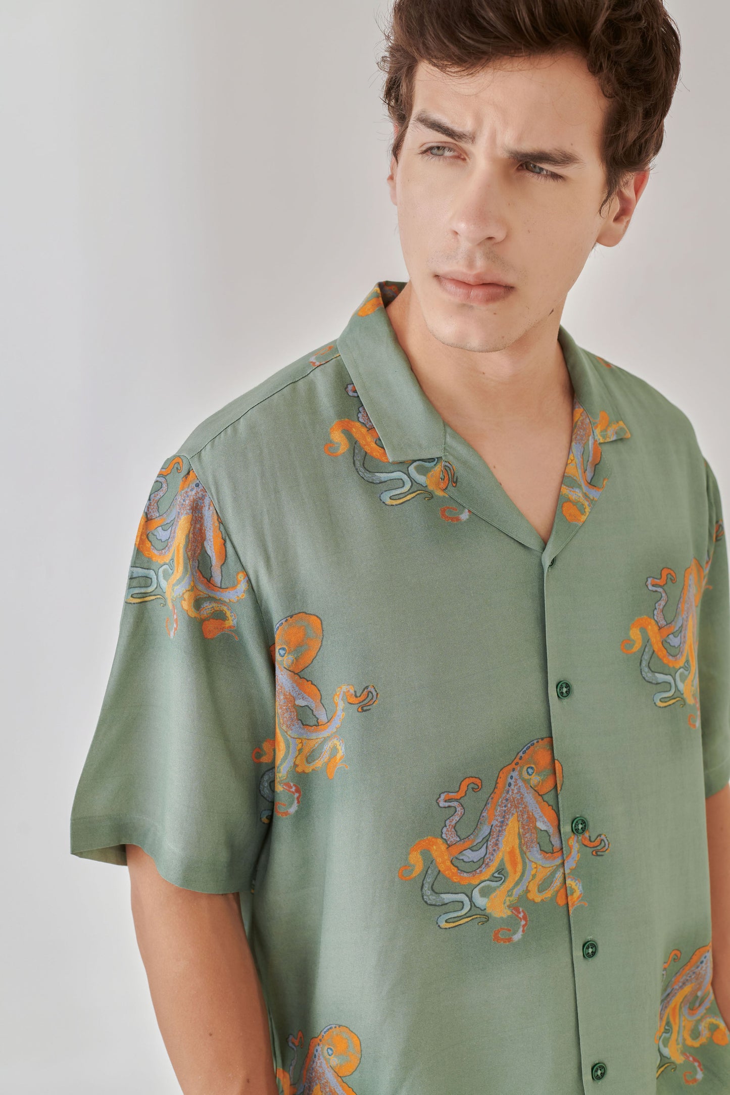 Trendy summer oversized shirt for men featuring a stylish octopus print in green fabric