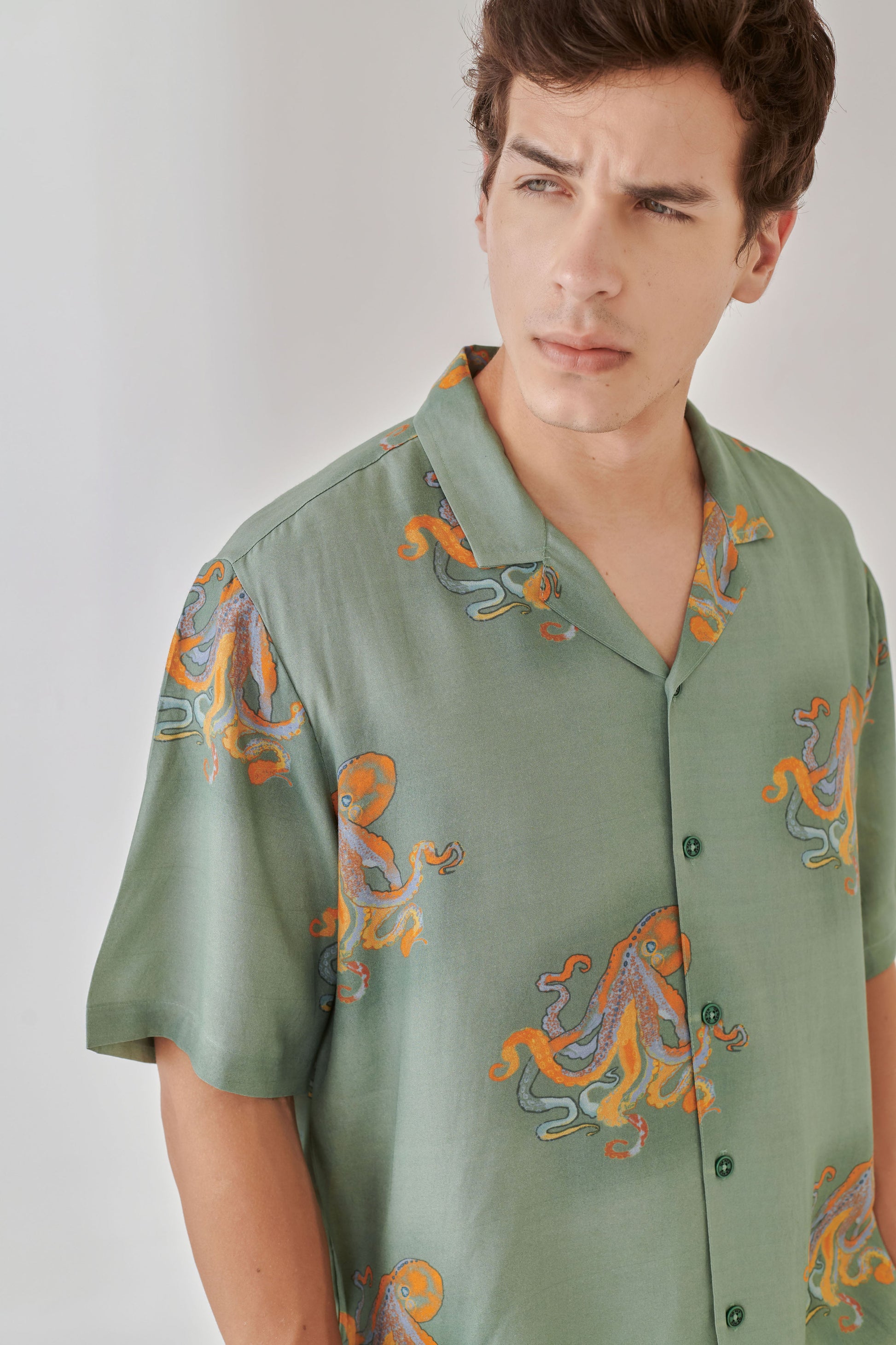 Trendy summer oversized shirt for men featuring a stylish octopus print in green fabric