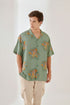 Trendy summer oversized shirt for men in green with colorful octopus pattern