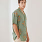 Trendy summer oversized shirt for men in green with colorful octopus print