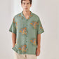 Trendy summer oversized shirt for men in green with orange graphic design by Stylera