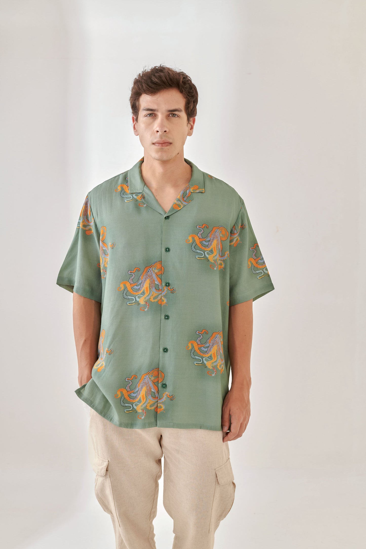 Trendy summer oversized shirt for men in green with orange graphic design by Stylera