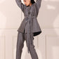 Trendy two piece pant suit women with stylish design and belted waist for a modern look