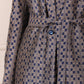 Trendy two piece pant suit women with stylish patterned fabric and a belted blazer design