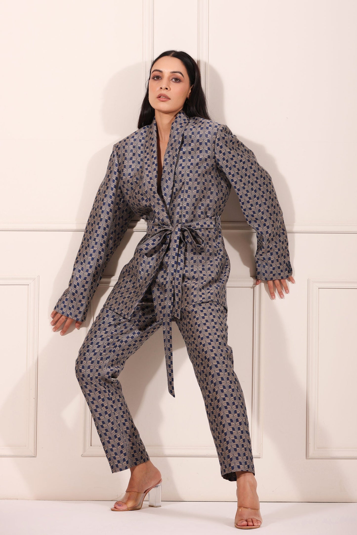 Trendy two piece pant suit women in gray with blue pattern and a belted waist for stylish occasions