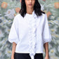 Stylera woman wearing ruffle front white top with puff sleeves paired with black pants trendy white tops for ladies