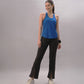Blue Stylera trendy workout tank top for women paired with black workout pants and sneakers