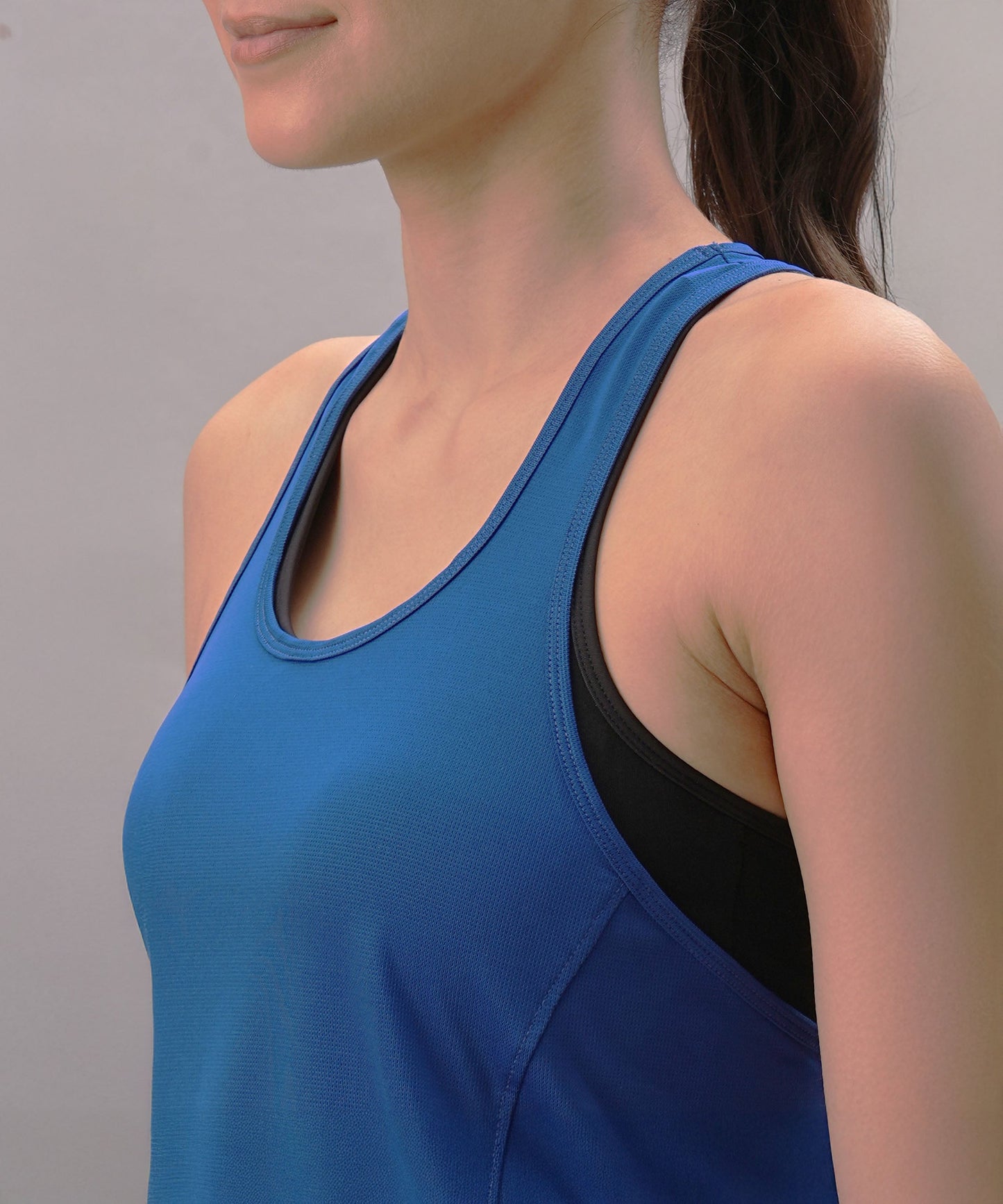 Elegant blue trendy workout tank top for women designed for comfort and style during exercise