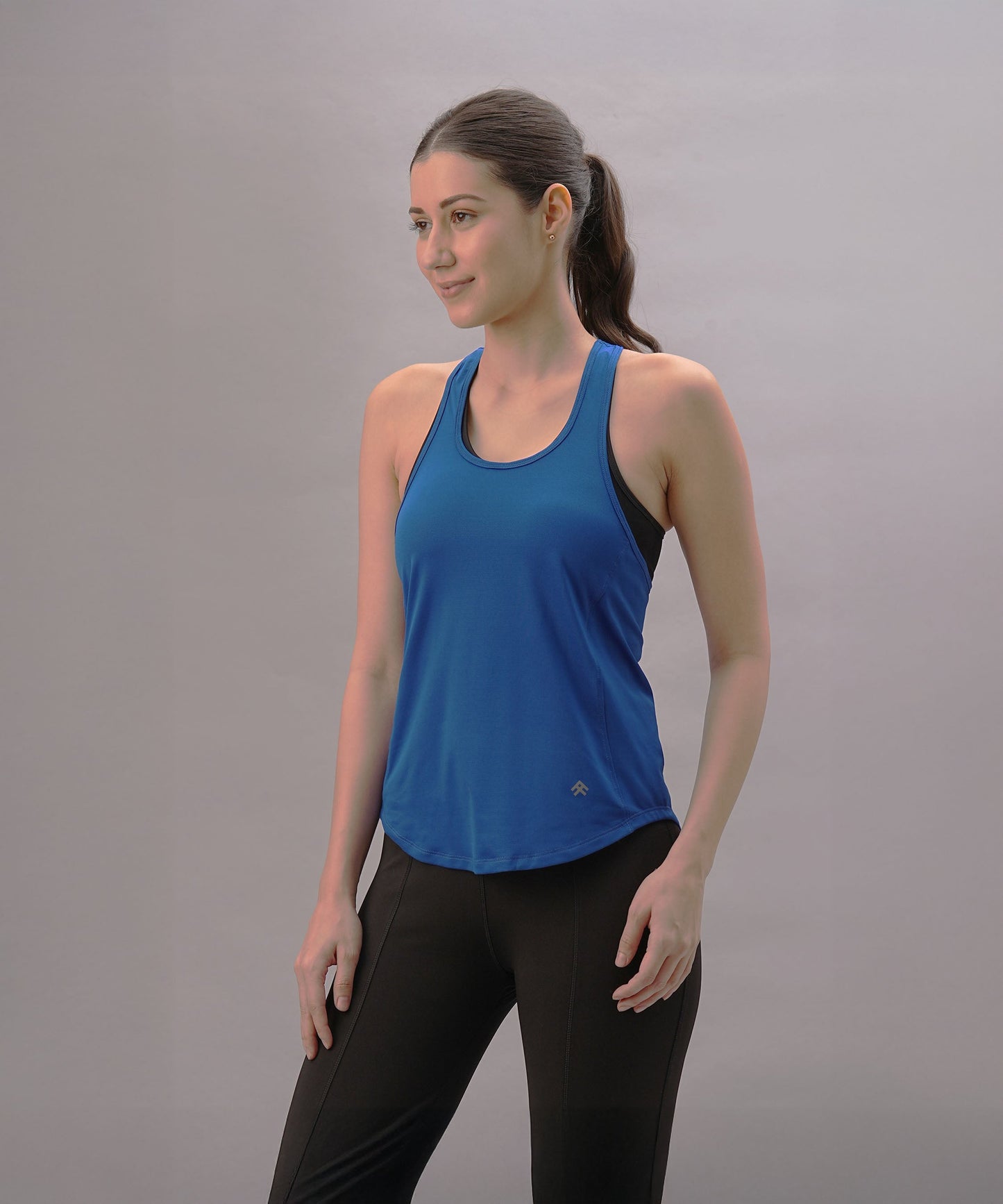 Stylera trendy workout tank top for women in blue, perfect for fitness enthusiasts
