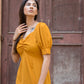 Trendy yellow slit midi dress with puff sleeves and a ruched bodice for a stylish look