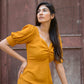 Trendy yellow slit midi dress with puff sleeves for a stylish summer look