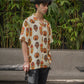 Tribal print yellow oversize shirt from Stylera with unique face designs