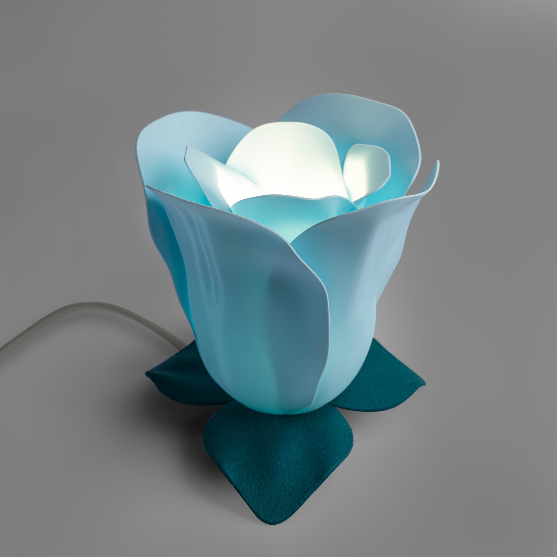 Sozori Aura Flower Lamp in Blue for unique bedroom accent lighting with a floral design