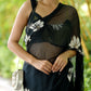 Elegant unique black saree for party wear with floral embroidery and sheer accents