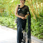 Elegant unique black saree for party wear featuring floral designs, perfect for festive occasions