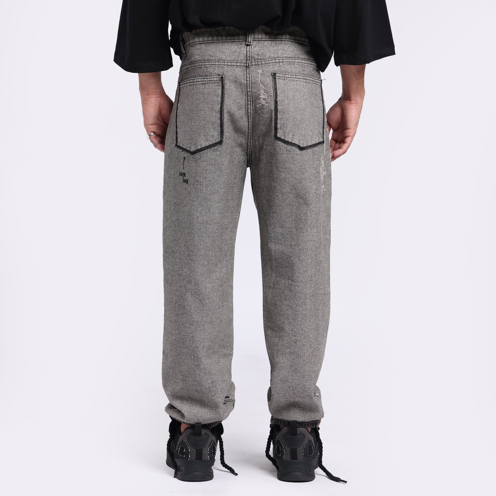 Stylera unique designer jeans for men featuring a stylish back pocket design and a comfortable fit