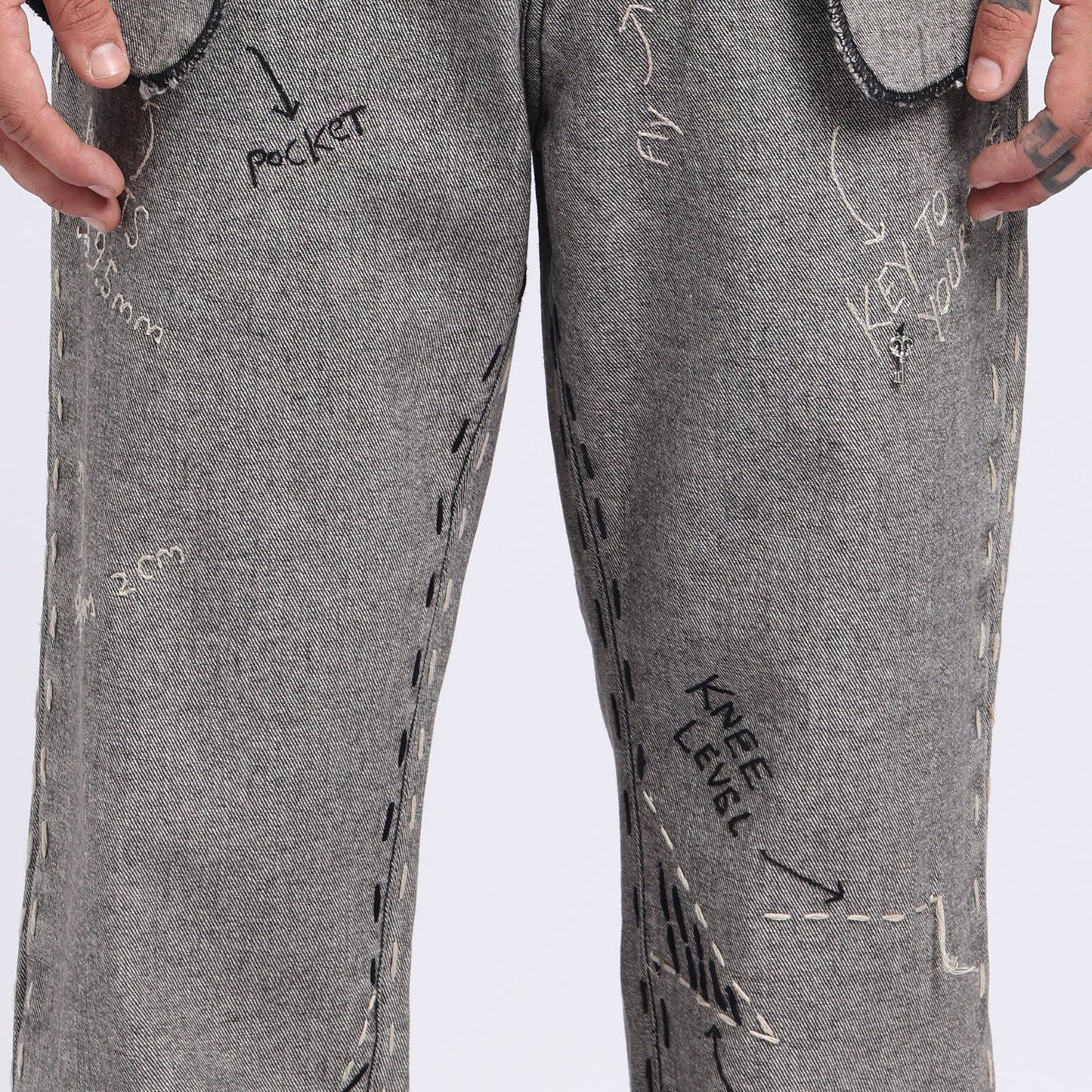 Stylera unique designer jeans for men featuring creative hand-drawn stitching details and multiple pockets