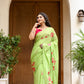 Unique designer malmal saree in vibrant green with floral embroidery for a stylish look