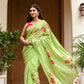 Unique designer malmal saree in green with floral embroidery, perfect for festive occasions
