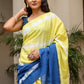 Unique designer saree for women in vibrant yellow and blue with artistic patterns for elegant style