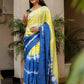 Unique designer saree for women in yellow and blue with a stylish tie-dye pattern