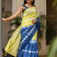 Unique designer saree for women in vibrant yellow and blue with traditional tie-dye patterns