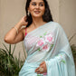 Elegant Stylera unique designer sarees for parties with floral prints in soft blue color