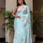 Stylera unique designer sarees for parties in light blue with floral embroidery and tassels