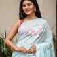 Elegant blue saree with floral designs from Stylera, perfect unique designer sarees for parties.