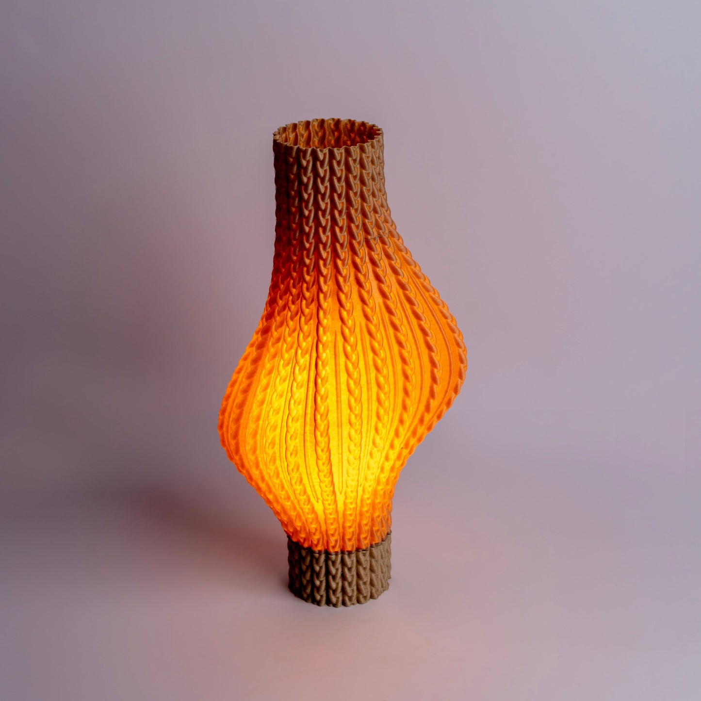 Sozori unique desk lamp for home office with an elegant orange glow and textured design
