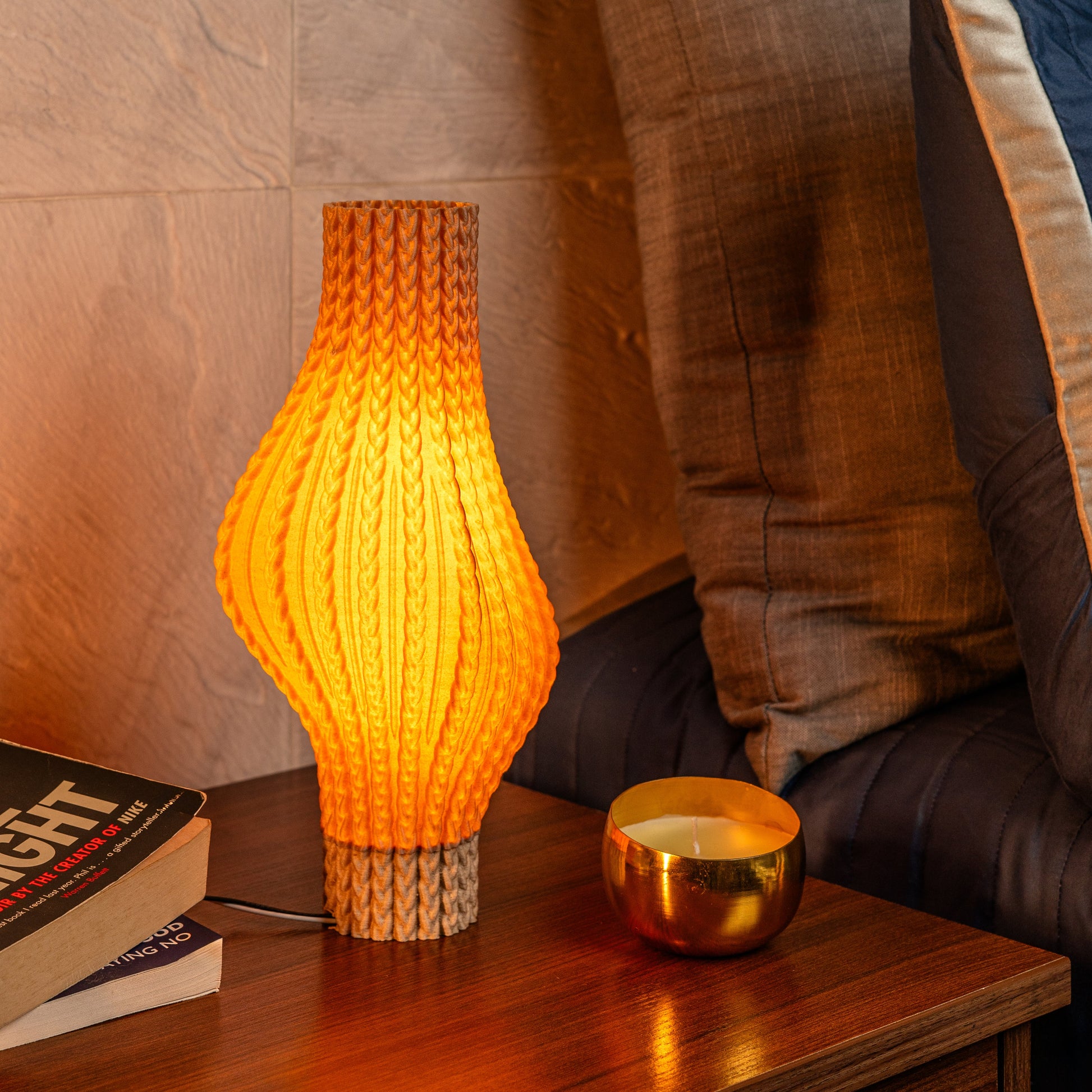 Sozori unique desk lamp for home office with a warm orange glow and textured design